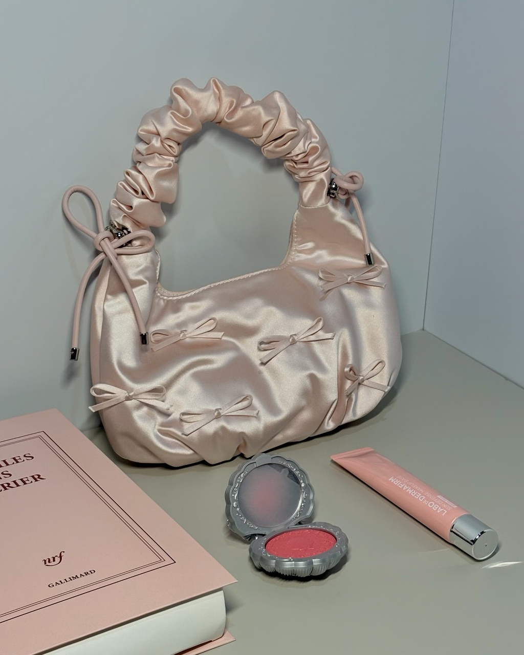 CHARLES & KEITH 小CK 粉色絲緞蝴蝶結皺摺綡繩雲朵包肩背包手提包CK2-40151496